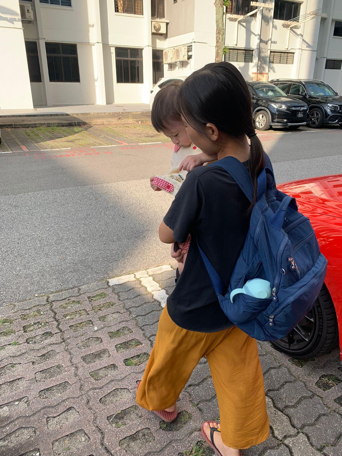Helper with toddler outdoor