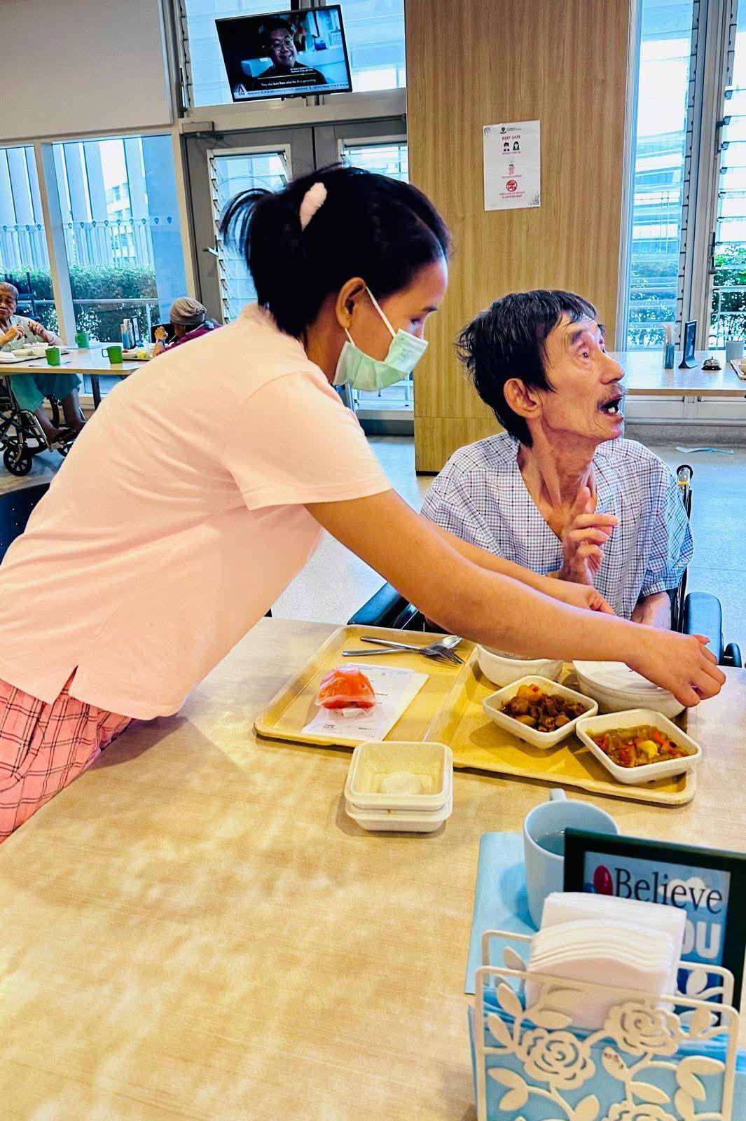 New Days helpers participating in in-house cooking training
